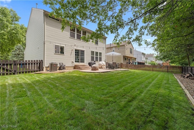 9034 Huxley Ln, Olmsted Twp, OH 44138 - back of property with a fenced backyard, a patio, and entry steps