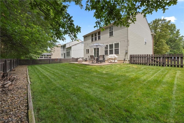 9034 Huxley Ln, Olmsted Twp, OH 44138 - rear view of property featuring a fenced backyard and a patio