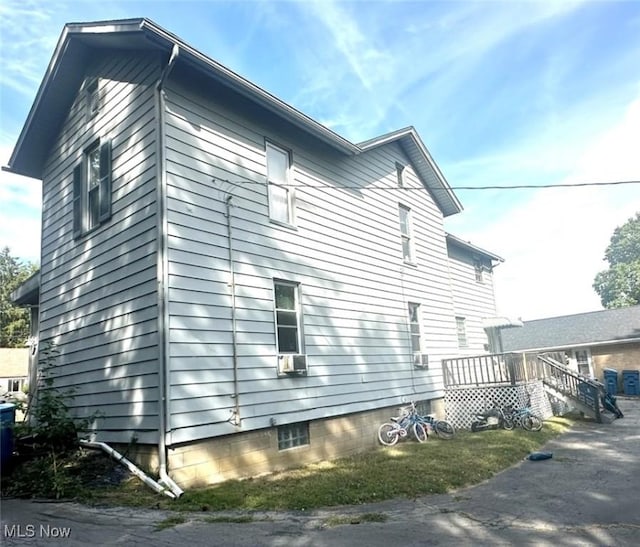 574 Spring St, Struthers, OH 44471 - view of home's exterior with a wooden deck