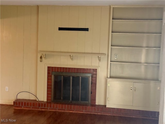 62239 Hillcrest Rd, Barnesville, OH 43713 - detailed view of a brick fireplace and wood walls