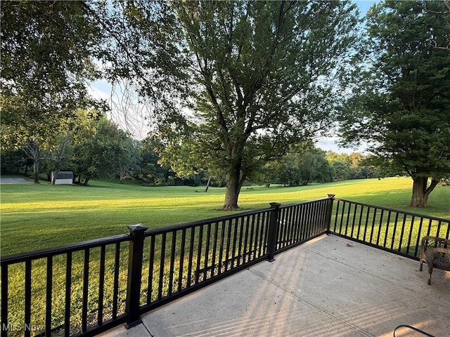 62239 Hillcrest Rd, Barnesville, OH 43713 - wooden deck featuring a lawn and view of wooded area