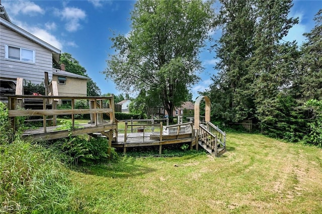 1266 Pitkin Ave, Akron, OH 44310 - view of green lawn featuring a deck