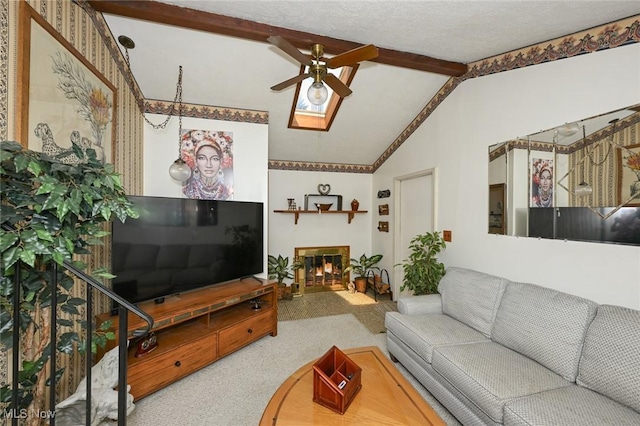 1266 Pitkin Ave, Akron, OH 44310 - living area with a ceiling fan, carpet, and a glass covered fireplace