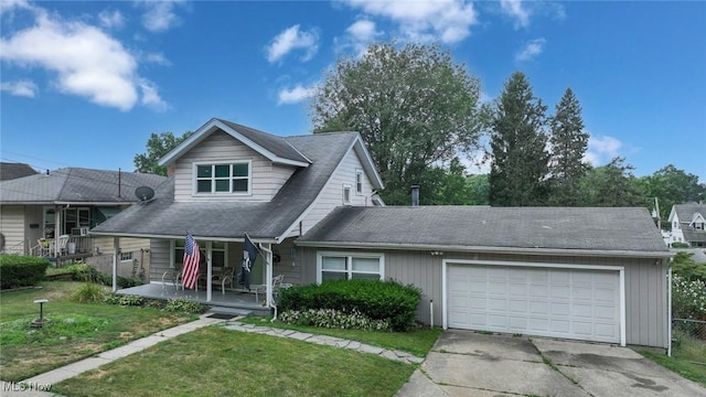 1266 Pitkin Ave, Akron, OH 44310 - view of front of home featuring a porch, a front lawn, concrete driveway, a garage, and a shingled roof