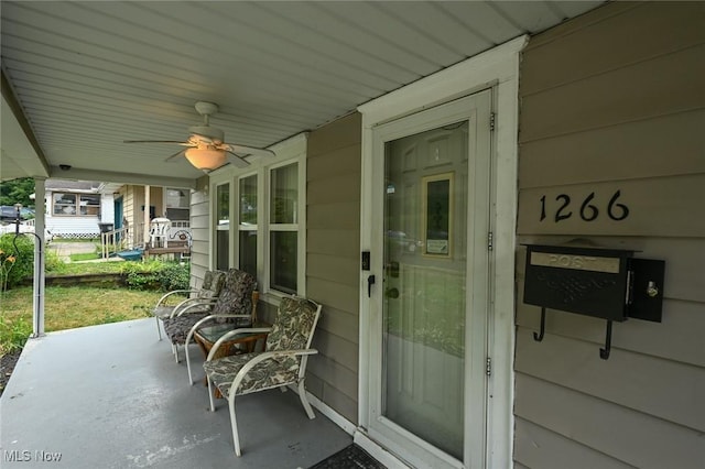 1266 Pitkin Ave, Akron, OH 44310 - covered porch with ceiling fan
