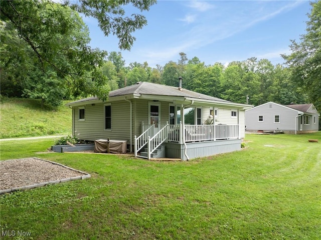 71050 Barries Dr, Martins Ferry, OH 43935 - back of house featuring a yard and covered porch