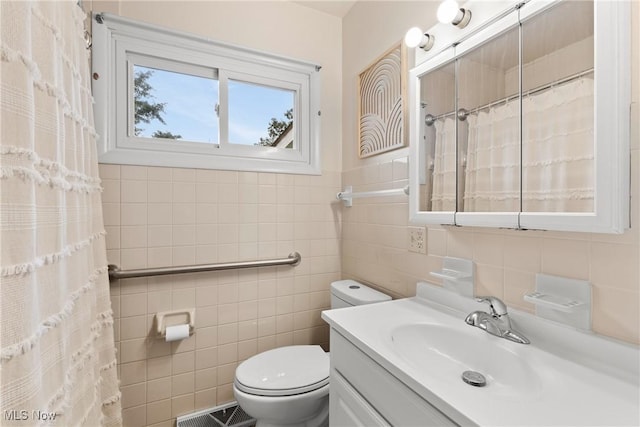 71050 Barries Dr, Martins Ferry, OH 43935 - full bathroom with tile walls, vanity, and a shower with curtain