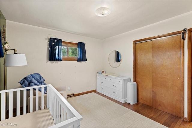 71050 Barries Dr, Martins Ferry, OH 43935 - bedroom featuring wood finished floors and a closet