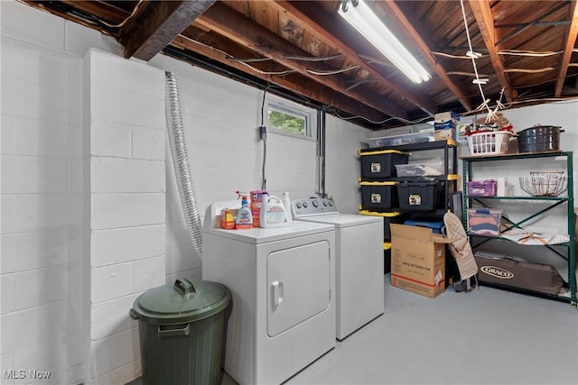 71050 Barries Dr, Martins Ferry, OH 43935 - laundry room with separate washer and dryer and concrete block wall
