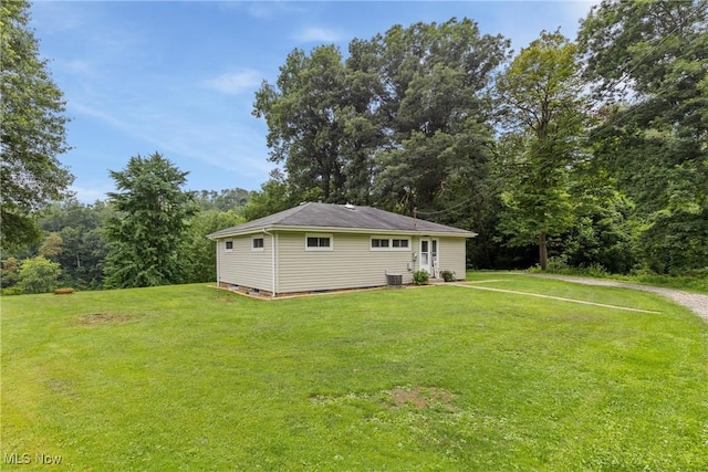 71050 Barries Dr, Martins Ferry, OH 43935 - view of side of property featuring a lawn and crawl space