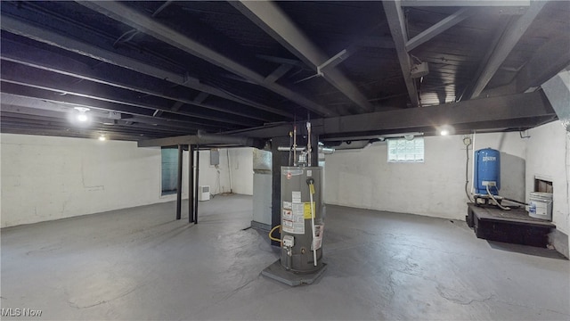 3187 Grenfall Rd, Norton, OH 44203 - basement with water heater and a water pressure tank