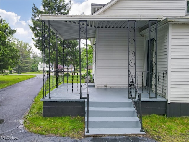 3187 Grenfall Rd, Norton, OH 44203 - view of exterior entry with a porch