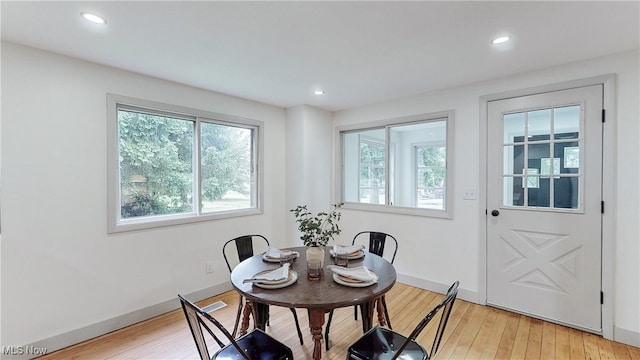3187 Grenfall Rd, Norton, OH 44203 - dining room featuring healthy amount of natural light, light wood finished floors, and recessed lighting