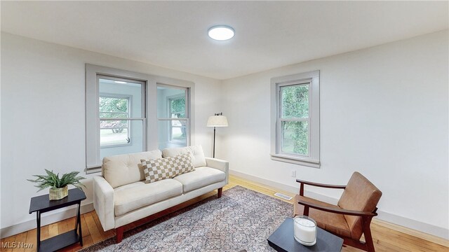 3187 Grenfall Rd, Norton, OH 44203 - living area featuring wood finished floors and baseboards
