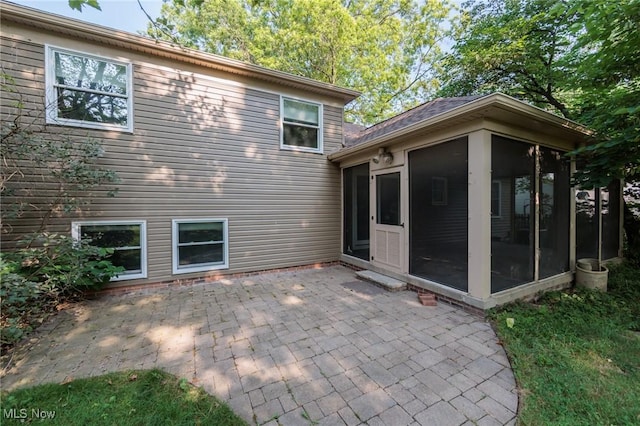 2271 Augusta Ct, Westlake, OH 44145 - rear view of house featuring a sunroom and a patio