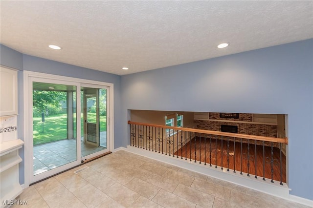 2271 Augusta Ct, Westlake, OH 44145 - spare room with recessed lighting, light tile patterned flooring, and a textured ceiling