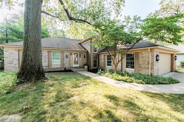 2271 Augusta Ct, Westlake, OH 44145 - view of front of property with brick siding, an attached garage, a front lawn, concrete driveway, and roof with shingles
