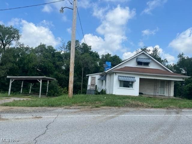70610 Chermont Rd, Bridgeport, OH 43912 - view of front of property with a chimney