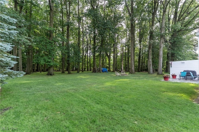 1403 Wexford Ave, Parma, OH 44134 - view of grassy yard featuring a patio area