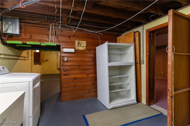 1403 Wexford Ave, Parma, OH 44134 - basement with washer / clothes dryer and wooden walls