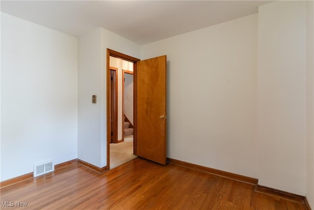 1403 Wexford Ave, Parma, OH 44134 - spare room with light wood-style flooring and baseboards