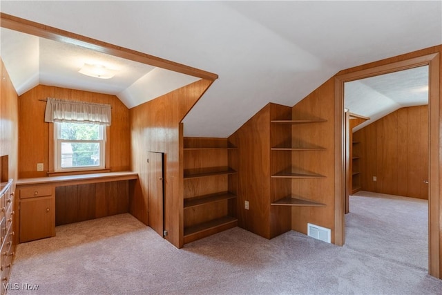 1403 Wexford Ave, Parma, OH 44134 - additional living space with lofted ceiling and light carpet
