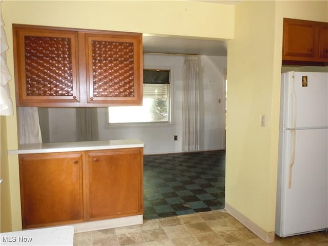 373 E 232nd St, Euclid, OH 44123 - kitchen with freestanding refrigerator and light countertops