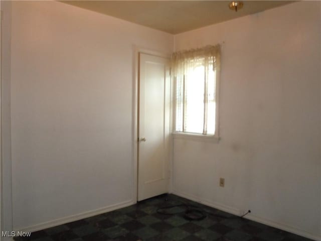 373 E 232nd St, Euclid, OH 44123 - spare room with baseboards and dark floors