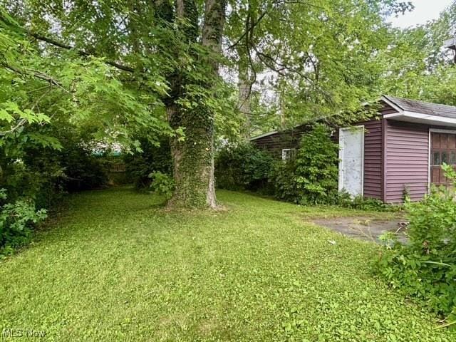 330 Inwood Blvd, Avon Lake, OH 44012 - view of grassy yard with an outbuilding