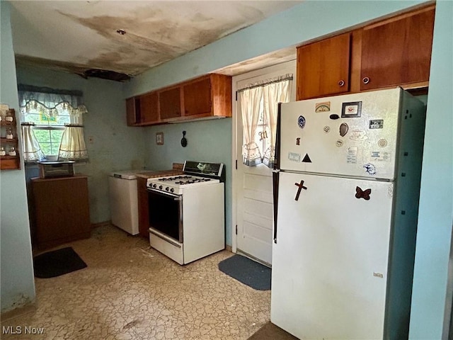 330 Inwood Blvd, Avon Lake, OH 44012 - kitchen with white appliances and brown cabinets