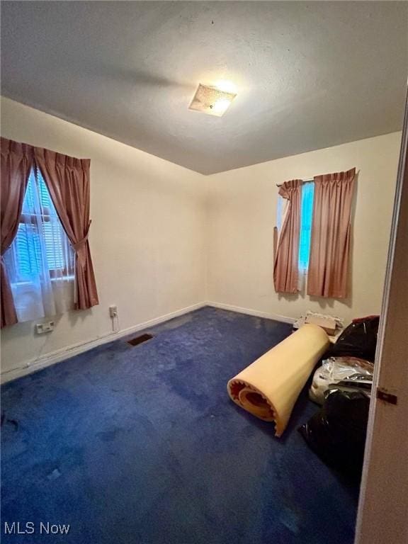 330 Inwood Blvd, Avon Lake, OH 44012 - unfurnished bedroom with carpet flooring and baseboards