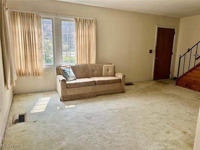 330 Inwood Blvd, Avon Lake, OH 44012 - living area with carpet floors and stairway