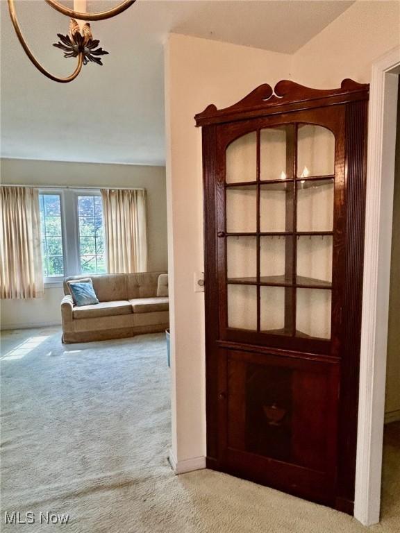 330 Inwood Blvd, Avon Lake, OH 44012 - hallway featuring light colored carpet and baseboards