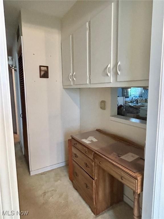 330 Inwood Blvd, Avon Lake, OH 44012 - kitchen with light carpet and baseboards