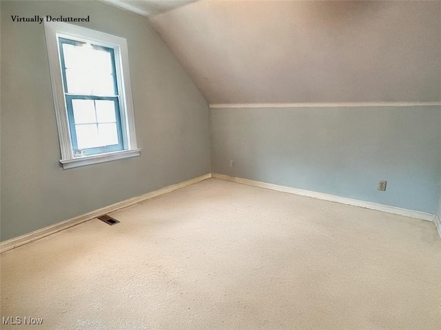 330 Inwood Blvd, Avon Lake, OH 44012 - additional living space featuring lofted ceiling and carpet