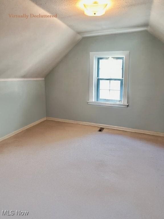 330 Inwood Blvd, Avon Lake, OH 44012 - bonus room with lofted ceiling and light colored carpet