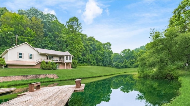 4101 Oak Ridge Ln, Cambridge, OH 43725 - dock with a yard, a water view, and a forest view