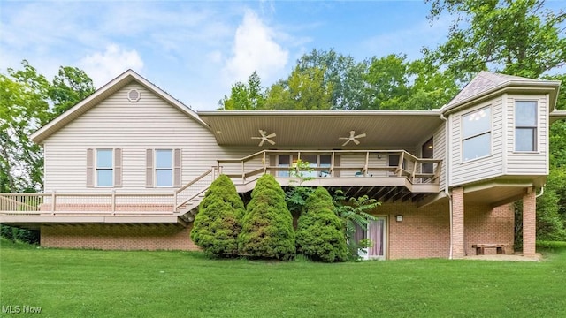 4101 Oak Ridge Ln, Cambridge, OH 43725 - back of house featuring a yard, brick siding, and a balcony