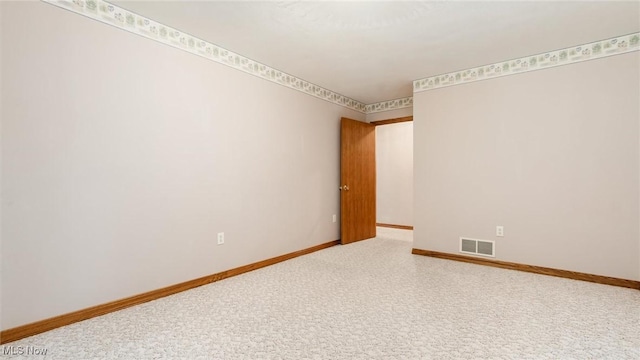 4101 Oak Ridge Ln, Cambridge, OH 43725 - carpeted empty room featuring baseboards