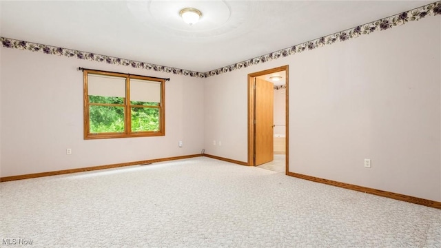 4101 Oak Ridge Ln, Cambridge, OH 43725 - unfurnished room featuring light carpet and baseboards