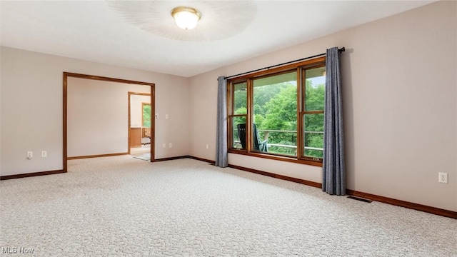 4101 Oak Ridge Ln, Cambridge, OH 43725 - empty room featuring light colored carpet and plenty of natural light