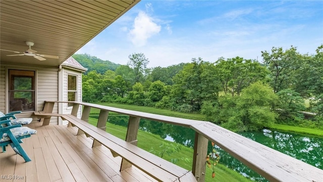 4101 Oak Ridge Ln, Cambridge, OH 43725 - deck with ceiling fan and a forest view