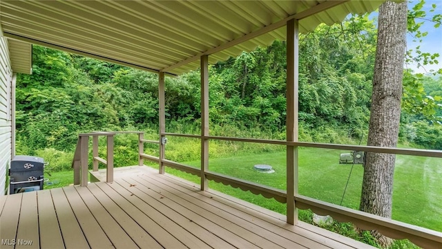4101 Oak Ridge Ln, Cambridge, OH 43725 - wooden terrace featuring a lawn and a forest view