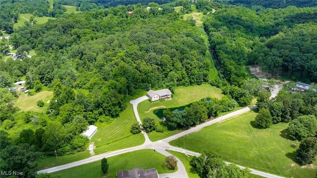 4101 Oak Ridge Ln, Cambridge, OH 43725 - aerial view of property and surrounding area featuring a forest