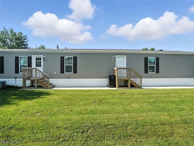 187 Garfield Ln, Jefferson, OH 44047 - back of house with a yard