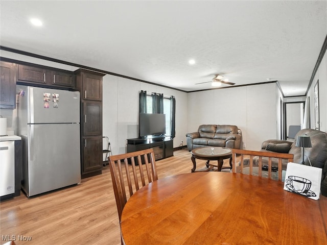 187 Garfield Ln, Jefferson, OH 44047 - dining area featuring ornamental molding, light wood-style floors, a ceiling fan, recessed lighting, and a decorative wall