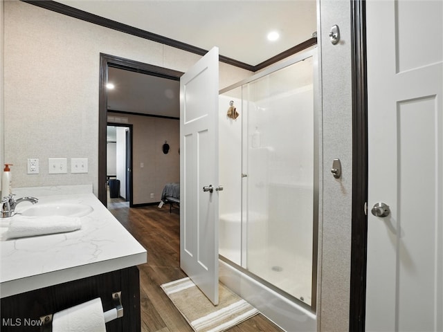 187 Garfield Ln, Jefferson, OH 44047 - ensuite bathroom featuring crown molding, a stall shower, wood finished floors, and vanity
