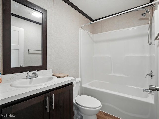 187 Garfield Ln, Jefferson, OH 44047 - full bath with vanity, tub / shower combination, wood finished floors, and ornamental molding