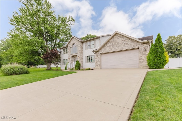 32 Par Three Dr, Follansbee, WV 26037 - view of front facade featuring a garage, concrete driveway, and brick siding