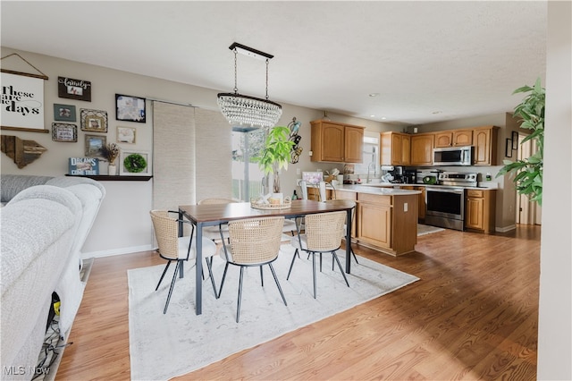 32 Par Three Dr, Follansbee, WV 26037 - dining room with light wood-style floors